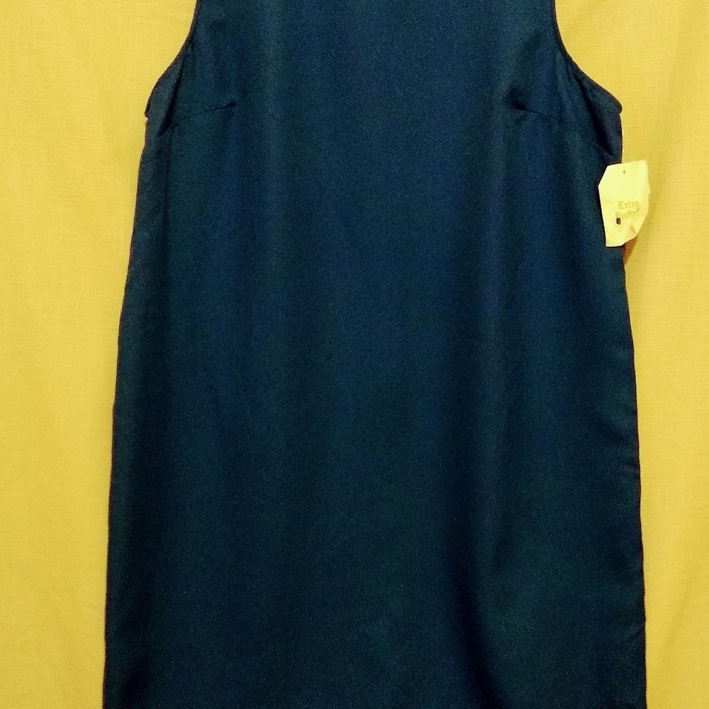 A signature collection blue dress by Vicky Wayne